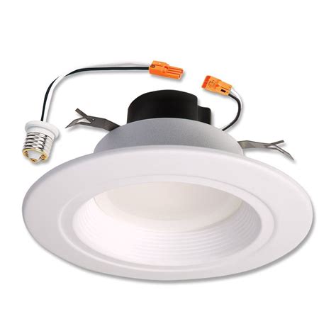 Recessed Lighting Buying Guide. Recessed lights, also known as downlights or can lights, are a type of lighting fixture installed into the ceiling or wall. They are designed to sit flush with the surface for a sleek and polished finish. The housing and electrical wiring components are hidden, and the bulb appears to glow from within the opening. 